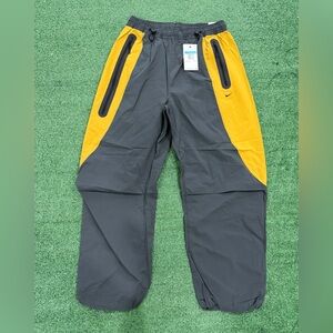 Nike Tech Pants Woven Stacked Oversized Zip Pocket IH8466-060 $130 Men's Medium